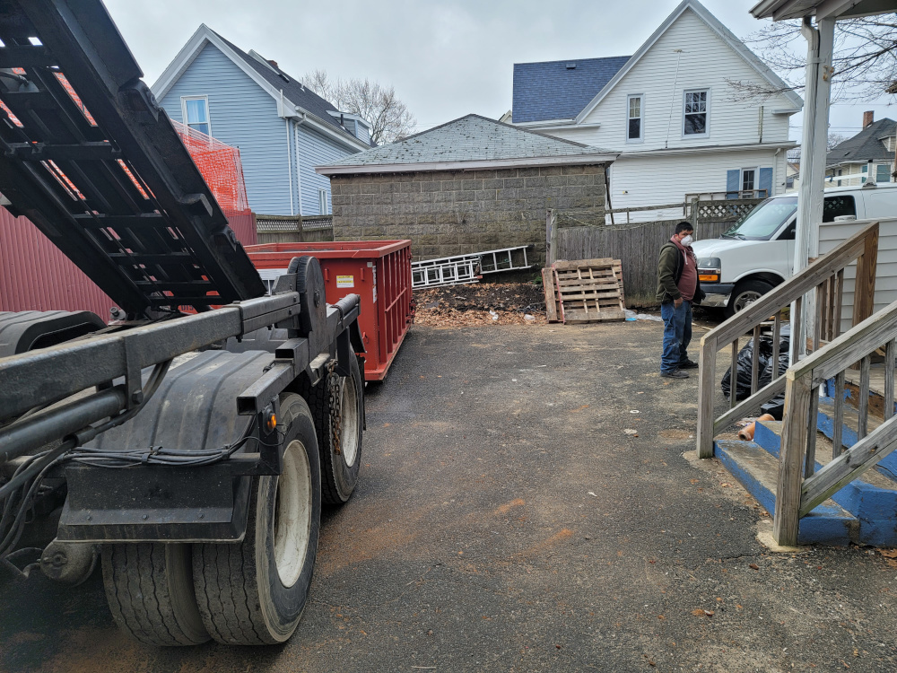 15 yard dumpster rental delivered to Lynn, MA for house cleanout. Dumpsters R Us, Inc