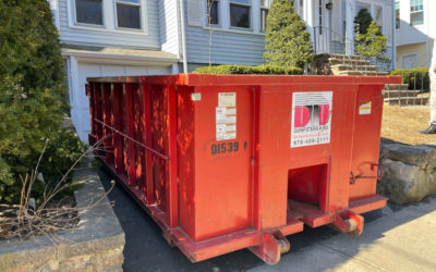 15 yard ABC dumpster delivery in Arlington MA for a stonewall and walkway repair.