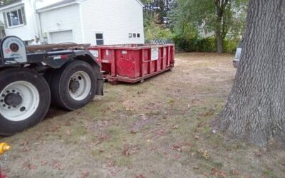 10 yard dumpster rental delivered in Tewksbury, MA for a garage clean-out.