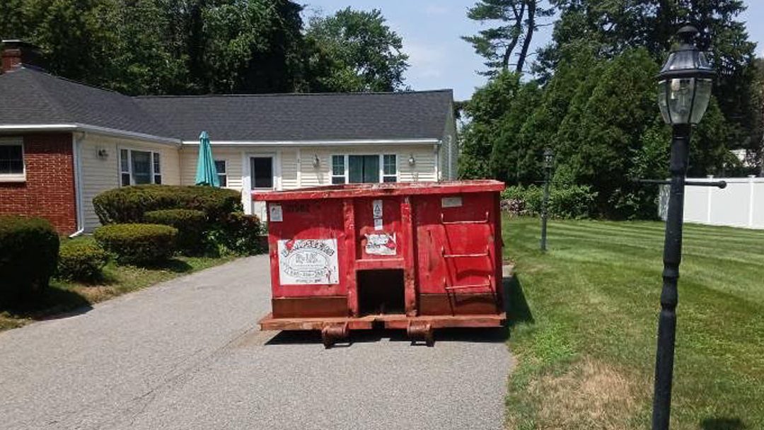 10-yard Construction & Demo dumpster pickup in Wilmington, MA 01887 after residential remodeling cleanup
