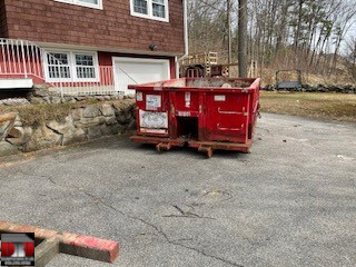 10 yard dumpster rented to get rid of construction debris in Hudson, NH