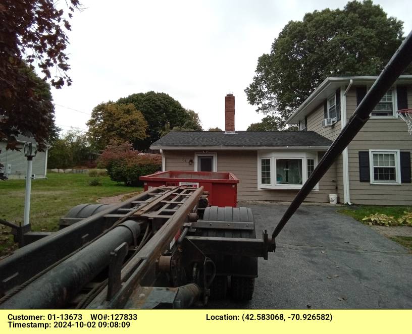 10 yard dumpster rental delivered in Danvers, MA for a house cleanout.