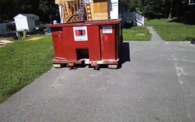 15 yard dumpster rental delivered in Tewksbury, MA for a construction project.
