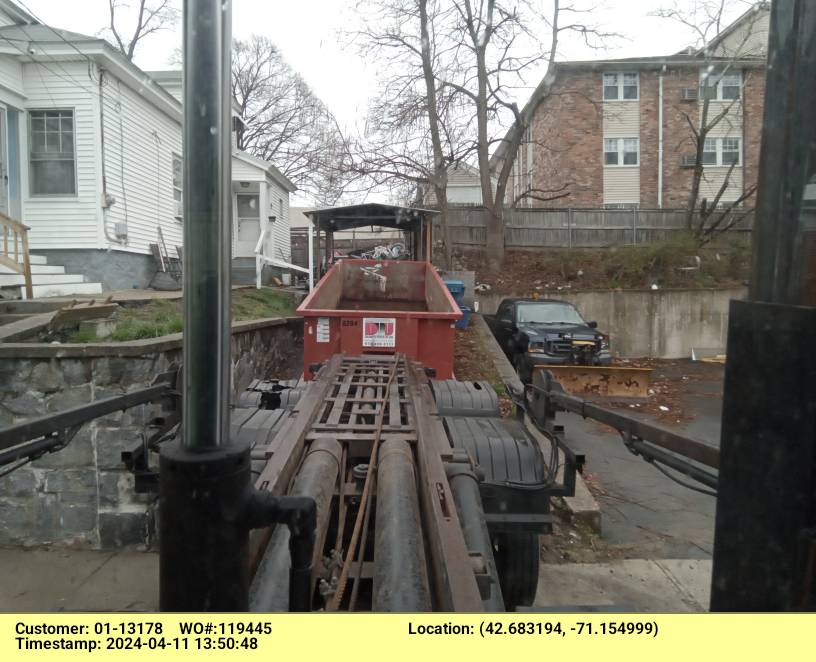 20 yard dumpster rental, with a 3 ton weight limit, delivered in Lawrence, MA for a construction project.