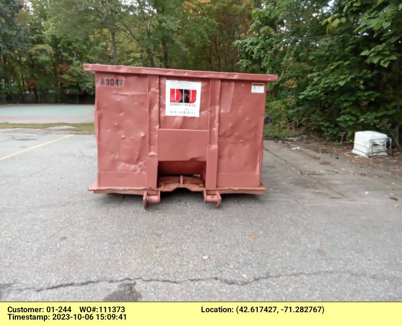30 yard dumpster rental delivered in Lowell, MA for a construction project.
