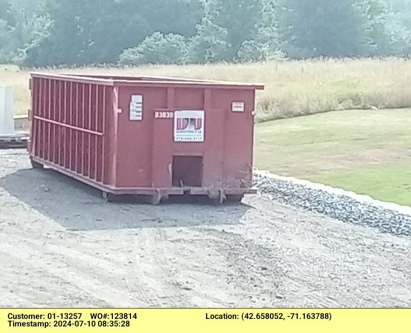 30 yard dumpster rental, with a 5 ton max, delivered to a construction site in Andover, MA