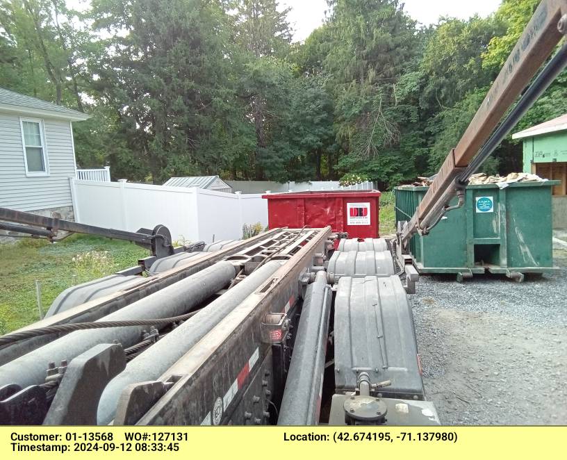 30 yard dumpster with a 4 ton weight limit delivered in Andover, MA for a construction project.