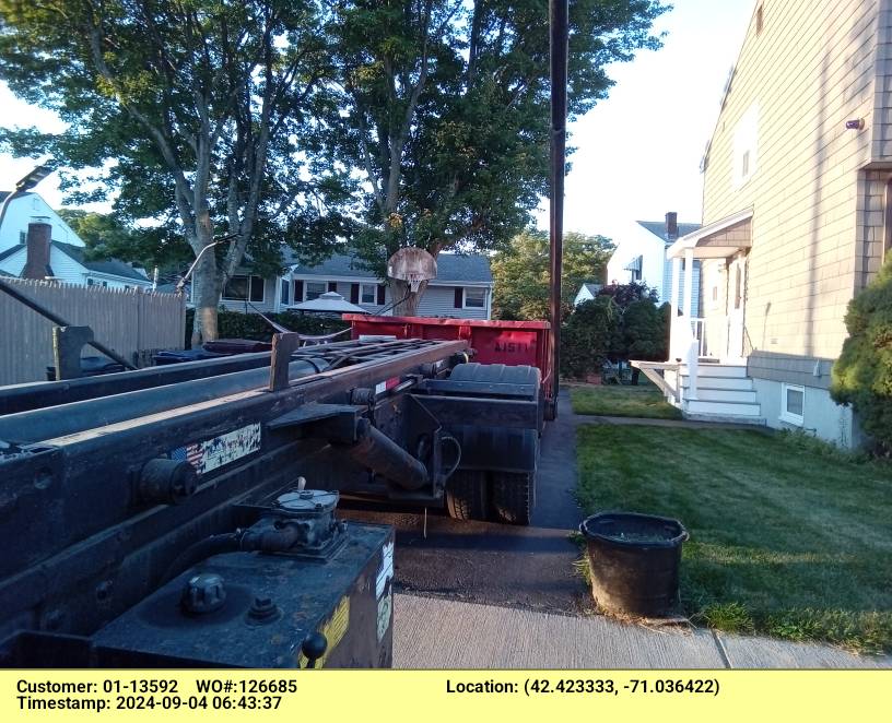 15 yard dumpster rental delivered in Everett, MA for a small construction project.