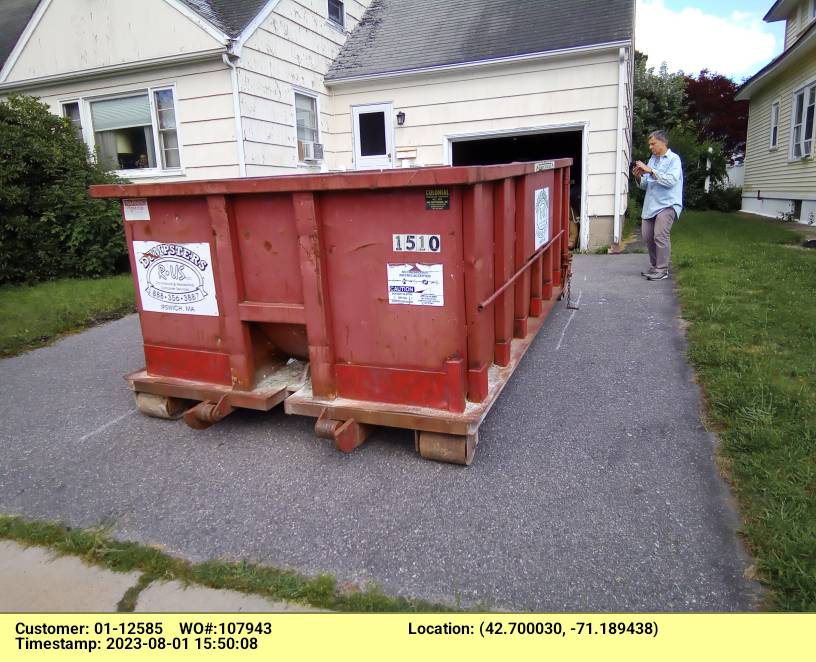 15 yard dumpster rental with a 2 Ton weight limit delivered in Lawrence, MA for a garage clean-out.