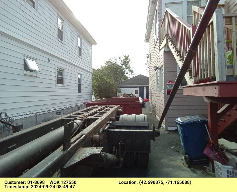 15 yard dumpster rental delivered in Lawrence, MA for a garage cleanout.