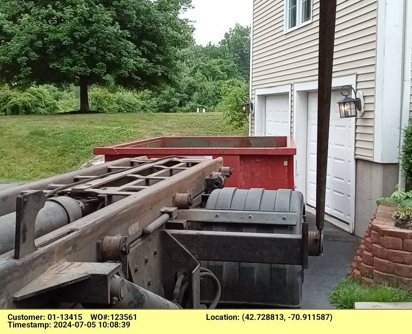 10 yard dumpster delivered in Rowley, MA for a garage cleanout.