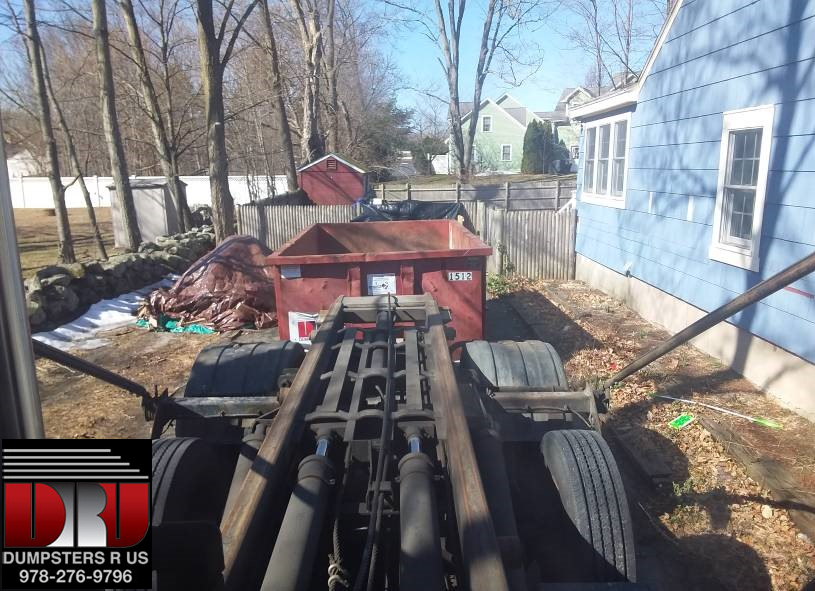 15 yard dumpster, with a 2 ton max, was rented to dispose of construction debris- mostly wood paneling and drop ceiling material. some household items, couches, tables, and kids toys in Tewksbury.