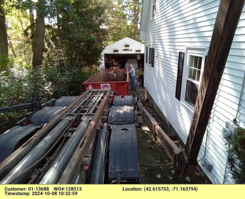 20 yard dumpster delivered to Magnolia, MA for a garage clean-out.