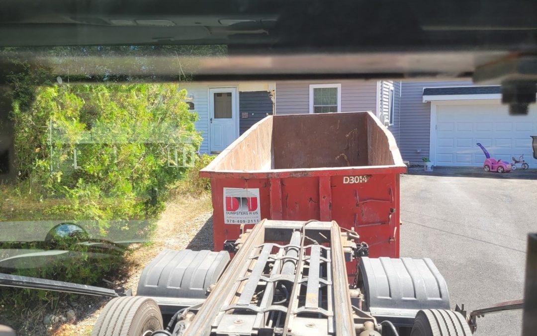 30 yard dumpster with a 5 ton max swapped out in Reading, MA for a construction project.