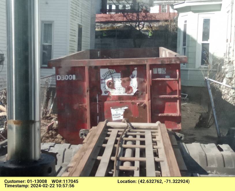 30 yard dumpster rental, with a 5 ton max, delivered in Lowell, MA for a construction project.