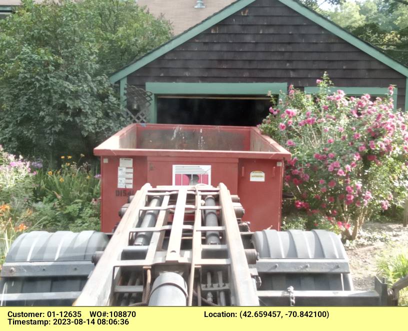 15 Yard dumpster with a 3-ton max delivered in Ipswich, MA for a roofing project.