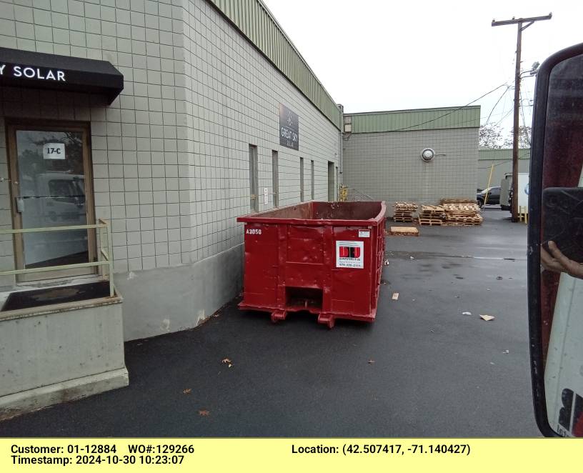 30 yard dumpster dumpster swapped out at a construction site in Woburn, MA