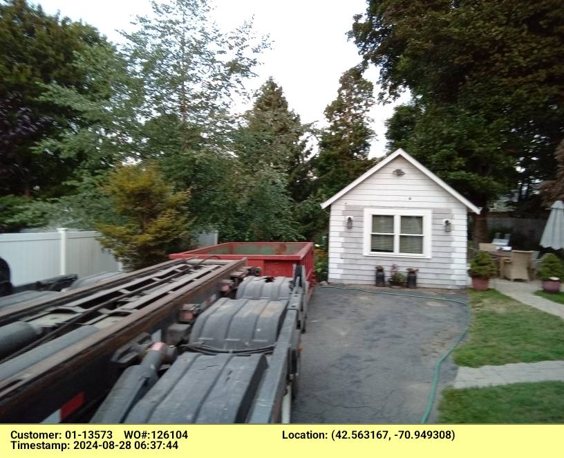 10 yard dumpster delivered in Danvers, MA for a house cleanout.