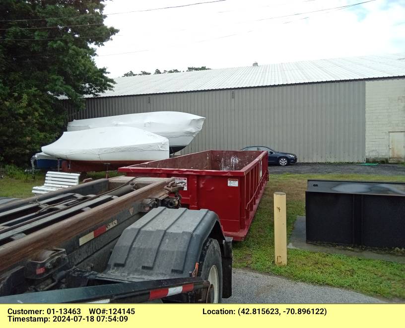 20 yard dumpster rental delivered in Newburyport, MA for a construction project.