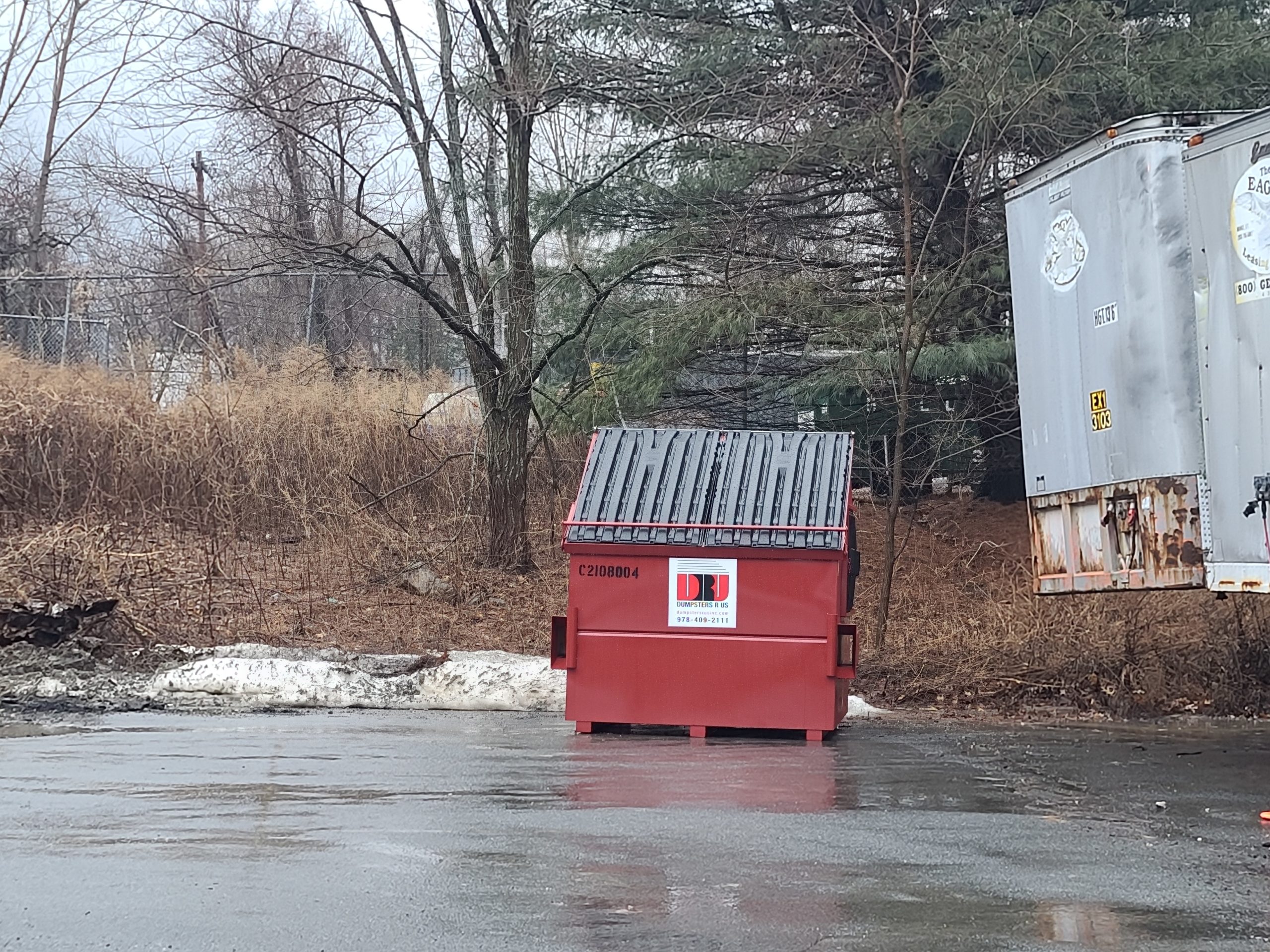 8yd commercial dumpster in Willmington MA for a Manufacturing Company