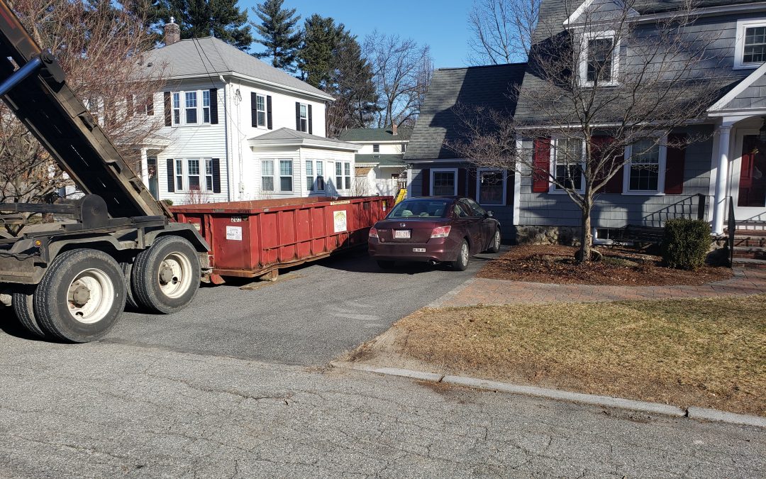 20 yard dumpster rental with a 3 ton max used to dispose of house junk in Chelmsford, MA by Dumpsters R Us, Inc