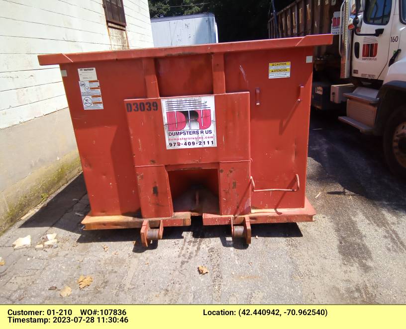 30 yard dumpster rental, with a 5 ton max, delivered in Andover, MA for a construction project.
