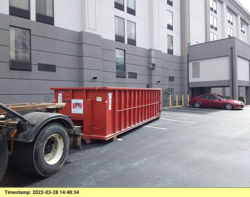 30 yard dumpster delivered to a Holiday Inn in Lawrence, MA for a construction project.