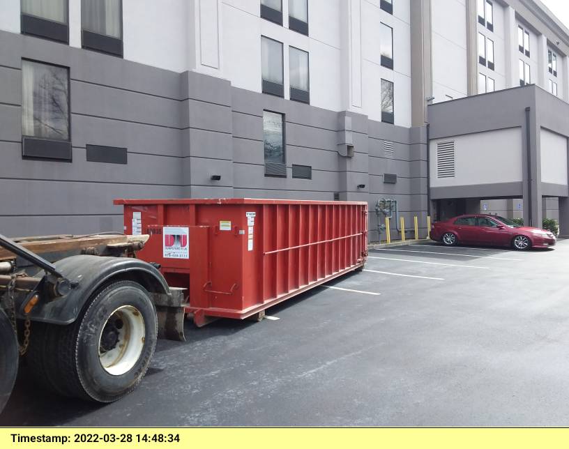 30 yard dumpster rental, with a 5 ton max, delivered to a Holiday Inn in Lawrence, MA for trash removal.
