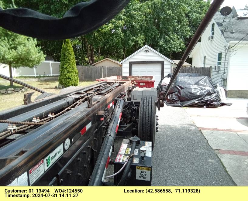 10 yard dumpster delivered in North Reading, MA for a garage clean-out.