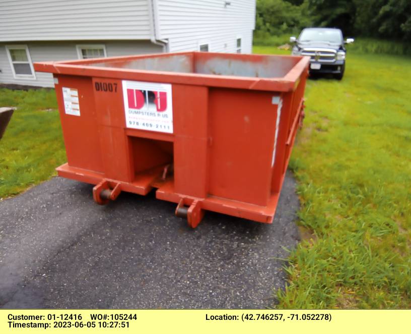 10 yard dumpster rental with a 1 ton weight limit delivered to a house in Haverhill, MA for a clean out.