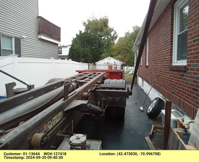 10 yard dumpster rental delivered in Saugus, MA for a house clean-out.