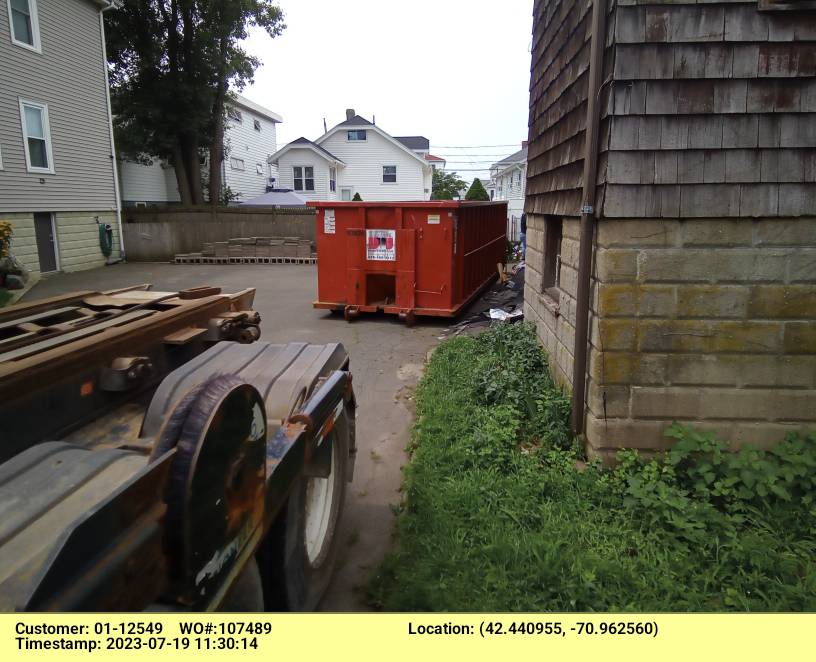 30 yard dumpster delivered in Revere, MA for a construction project.