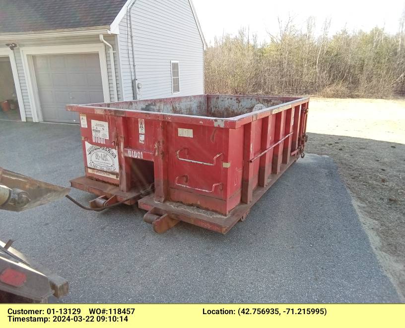 10 yard dumpster with a 1 ton weight limit delivered in Haverhill, MA for a garage clean-out.