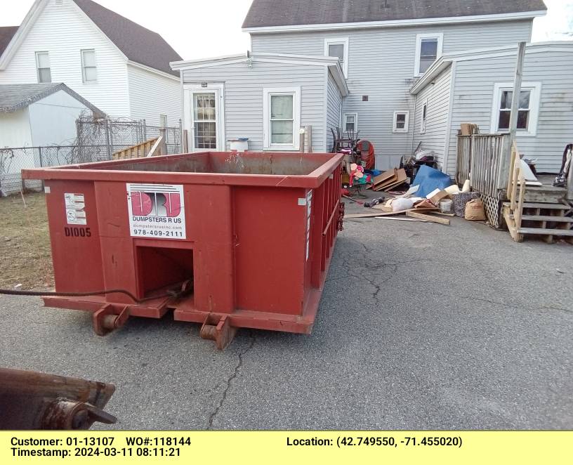 10 yard dumpster rental, with a 1 ton weight limit, delivered in Nashua, NH for junk removal.
