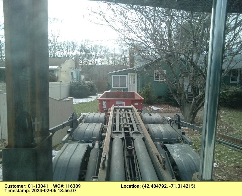 15 yard dumpster rental with a 3 ton max delivered in Bedford, MA for a house clean-out.
