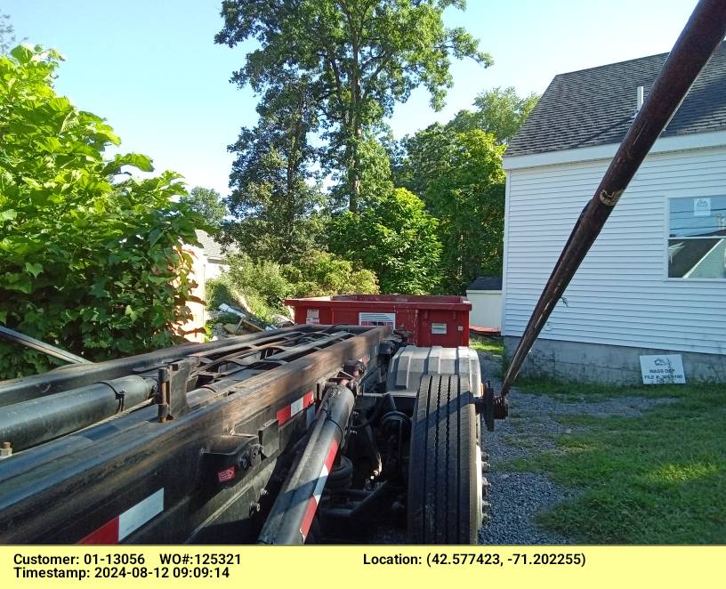 15 yard dumpster delivered in Tewksbury, MA for a construction project.