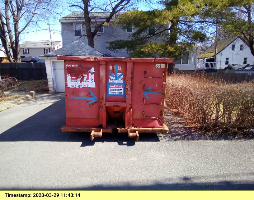 30 yard dumpster rental delivered to a house in Peabody, MA for a garage cleanout.