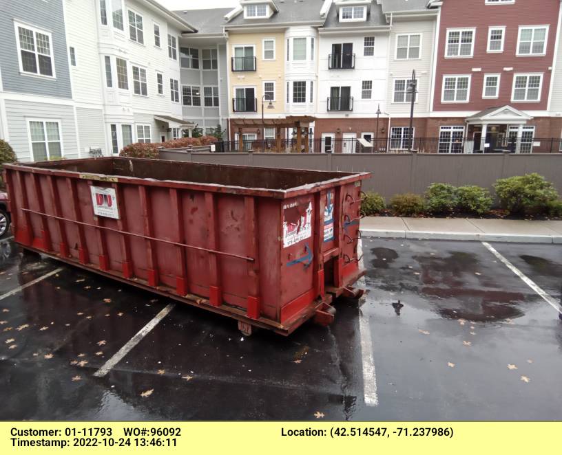 30 yard dumpster delivered to a condo complex for a construction project in Bedford, MA