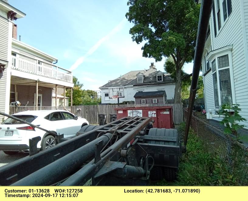 15 yard dumpster rental delivered in Haverhill, MA for junk removal from a home.