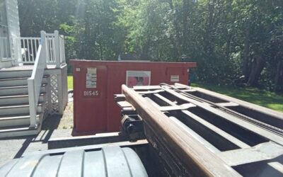 15 yard dumpster rental delivered in Tewksbury, MA for a roofing project.