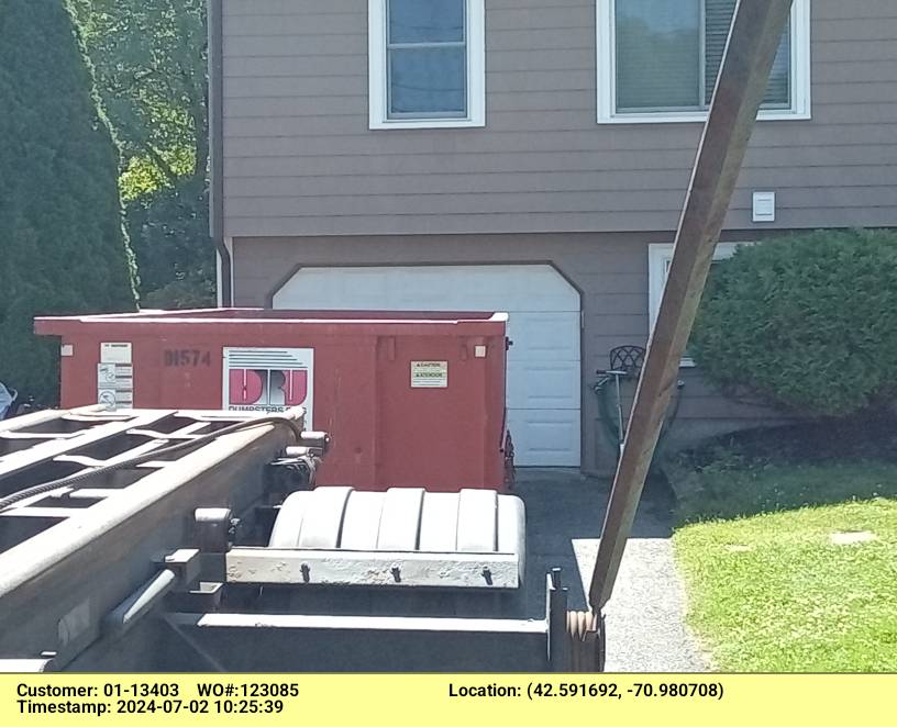 15 yard dumpster rental, with a 2 ton limit, delivered in Danvers, MA for a garage clean-out.