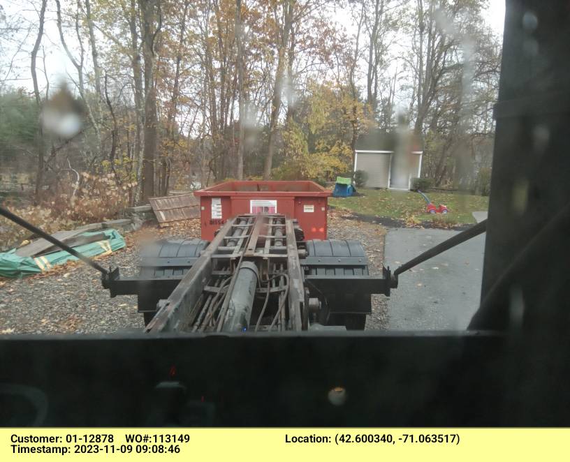 15 yard dumpster rental with a 2 ton weight limit delivered in North Reading, MA for a house clean-out.