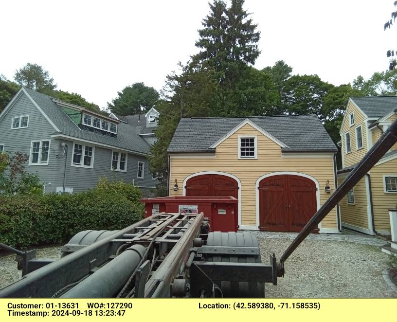 15 yard dumpster rental delivered in Manchester, MA for a barn clean-out