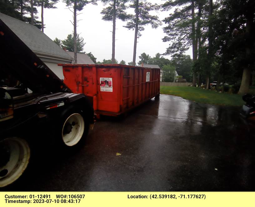 30 yard dumpster rental with a 4 ton weight limit delivered in Wilmington, MA for a massive clean-out.