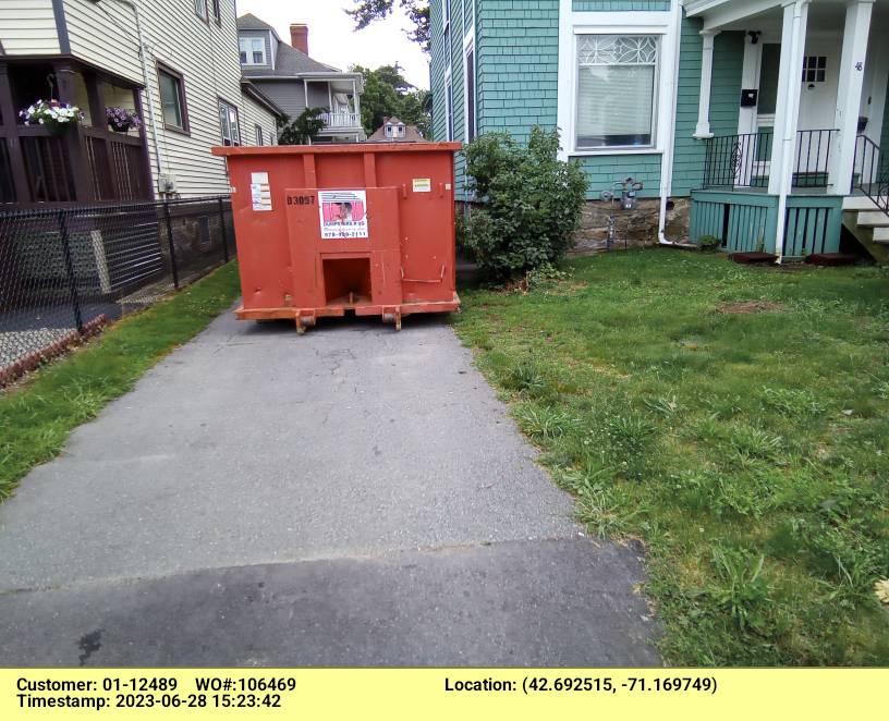 30 yard dumpster with a 4 ton weight limit delivered in Lawrence, MA for a house cleanout.
