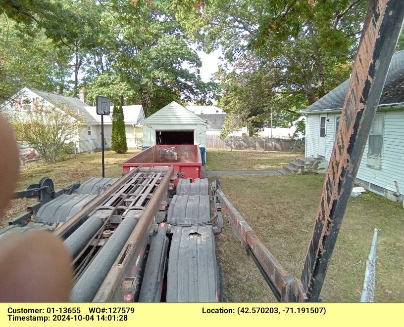 20 yard dumpster delivered in Tewksbury, MA for a garage cleanout.