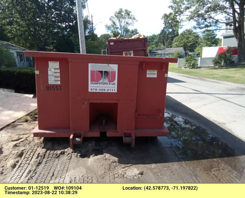15 yard dumpster rental with a 3 ton max delivered in Tewksbury, MA for a construction project.