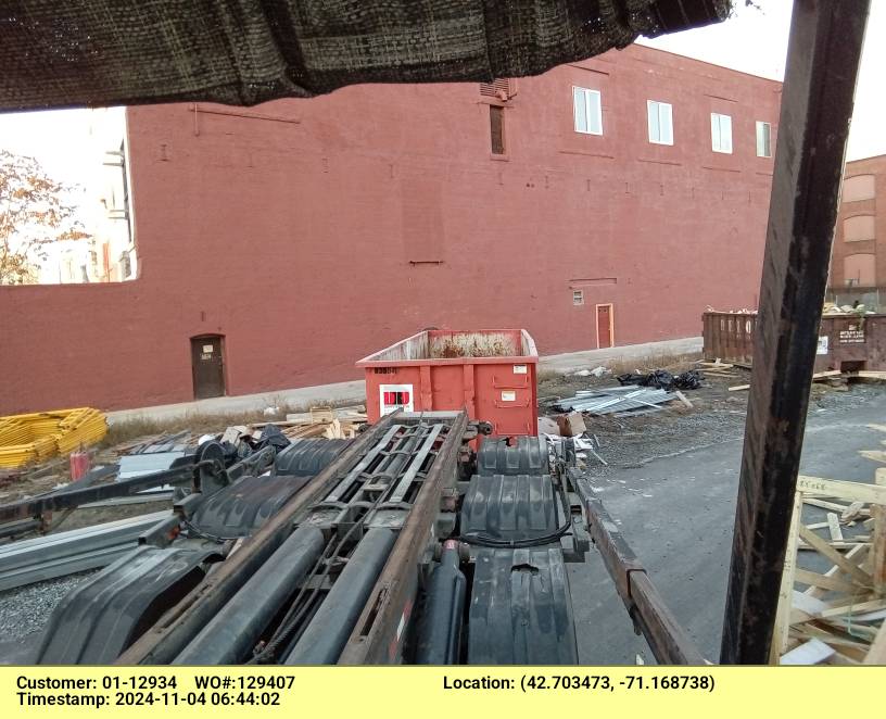 30 yard dumpster swapped out at a construction site in Lawrence, MA.