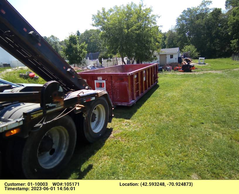 15 Yard dumpster with a 2 ton weight limit delivered in Wenham, MA for a house/yard cleanout.