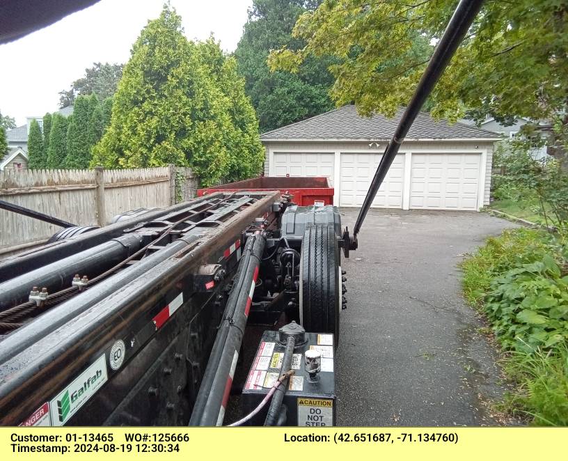 20 yard dumpster delivered in Andover, MA for a garage cleanout.